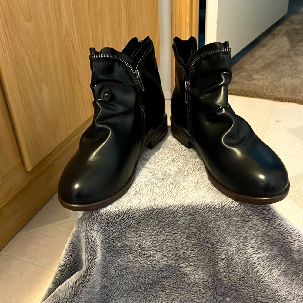 NWOT women’s ankle boot.